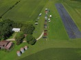Skyhawks field, looking north. Farm, grain bins and flight line.